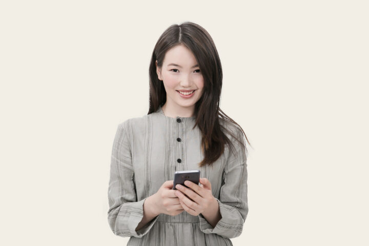 A client checking her portfolio on a phone